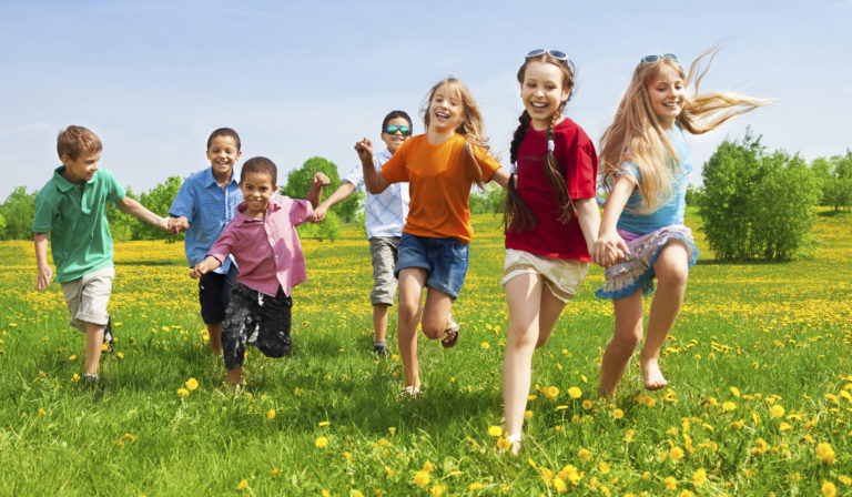 Pediactric Care - healthy kids running in field
